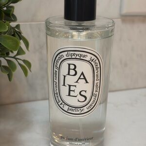 Diptyque - Baies Room Spray - Opened and some of the room spray has been used.